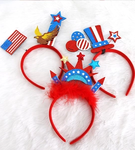 Close-up of three 4th of July headbands with stars, eagle, and top hat decor
