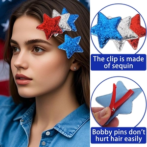 Close-up of glitter star clips featuring red, white, and blue sequins with hair-safe ribbon