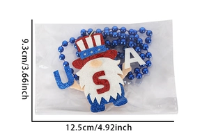 Patriotic USA gnome ornament with blue beads, glitter finish, 12.5cm width dimension