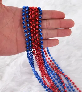 Detail of red and blue metallic bead chain for Independence Day party decorations
