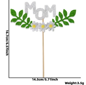 Silver glitter MOM cake topper with white flowers and green leaves details, 16.7x14.5cm