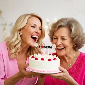Mother's Day I Love Mom cake topper with daisies on a strawberry cake held by a happy family