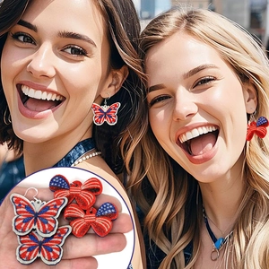 Detail view of butterfly American flag earrings with patriotic red white and blue stars