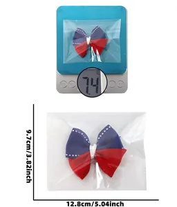 Detail view of Independence Day bow hair clip weighing 7.4g with product dimensions