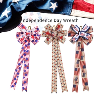 Detail of USA Independence Day bow hangers with stars, stripes, and red truck patterns