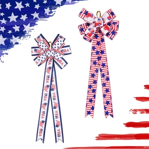 Close-up of patriotic USA flag bow ornaments with red white and blue star patterns