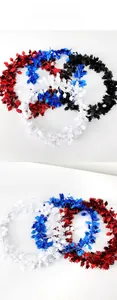 Close-up of sparkling graduation tinsel garlands in red, blue, black and white colors