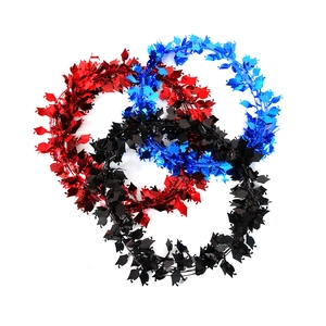Three-piece graduation tinsel garland set with metallic mortarboard caps in red, blue, and black
