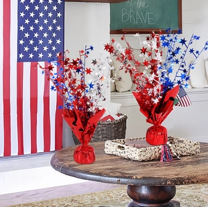 Detail of red white and blue star table centerpieces for Independence Day party decor