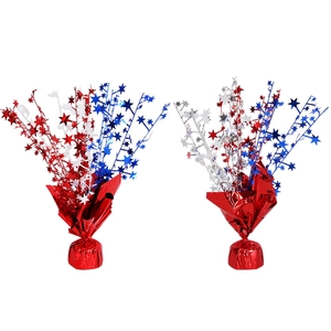 Fourth of July table centerpiece featuring red, silver, and blue metallic star decorations
