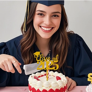 Close-up of golden Class of 2025 acrylic cake topper with graduation cap design