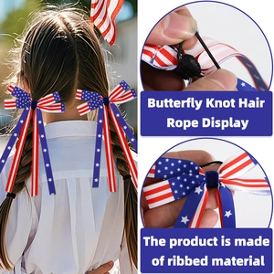 Detailed view of patriotic bow hair ties with American flag stars and stripes pattern