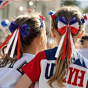 Patriotic red white and blue bow hair ties with long streamers for Independence Day party
