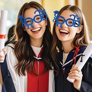 Detail of blue glitter 2024 graduation glasses with tassel and diploma motifs