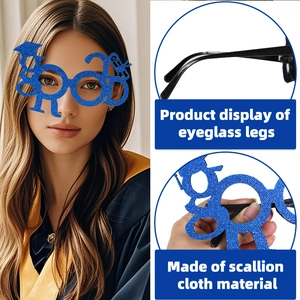 Close-up of blue glitter GRAD eyewear showing the sparkly fabric and frame structure