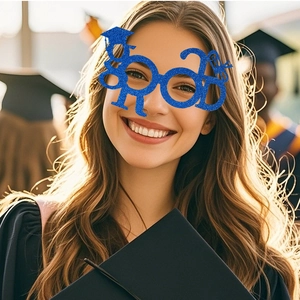 Glitter blue GRAD party glasses with doctoral cap shown on model at graduation