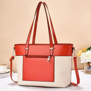 Grande borsa tote minimalista in pelle arancione e tessuto con tracolla regolabile
