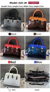 Detail view of colorful snake skin pattern tote bags with multi-compartment interior
