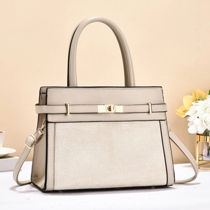 Elegant beige satchel handbag with golden hardware and adjustable strap for daily use