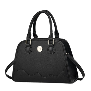 Black minimalist tote bag in litchi grain leather with gold hardware and wave stitching