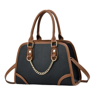 Elegant black lychee grain leather handbag with brown handles and gold chain accents