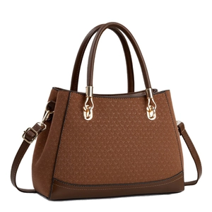 Brown textured tote bag with top handle and gold hardware shown on a white background