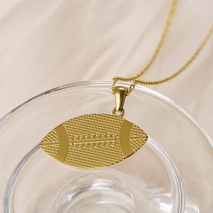 Golden stainless steel American football pendant necklace with detailed sports pattern