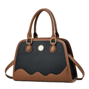 Retro patchwork tote bag with brown and black lychee texture and round metal logo