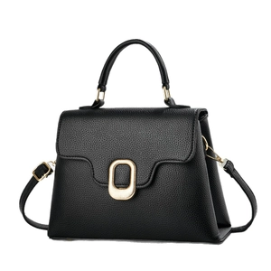 Classic black pebbled leather handbag with gold metal clasp and detachable shoulder strap