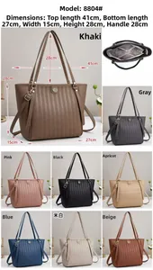 Detailed view of tote bag interior layout and dimensions with striped embossed texture
