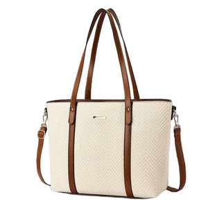 Chic beige herringbone tote bag with brown leather trim and detachable shoulder strap