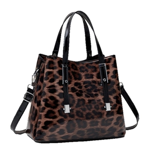 Fashionable leopard print tote bag in glossy patent leather with silver hardware