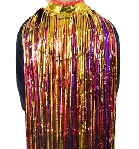 Macro shot of colorful metallic foil tassels in red, gold, and purple for party capes