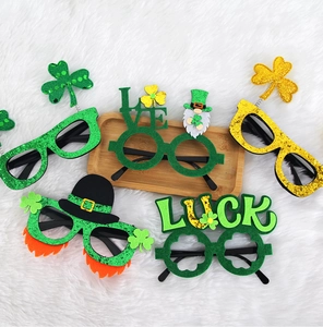 Detailed view of St. Patrick's Day shamrock party glasses set with glitter felt designs