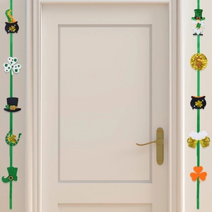 St. Patrick's Day door banner with green tassels, shamrocks, and gold glitter shamrock charms