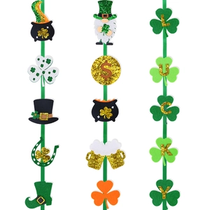 St. Patrick's Day party hanging banner with lucky clovers and green felt gnomes