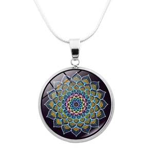 Close-up of circular yoga mandala pendant necklace with silver glass dome detail