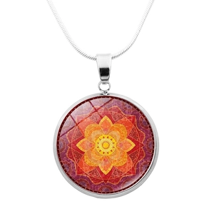 Detailed macro view of the silver snake chain and mandala glass dome pendant necklace