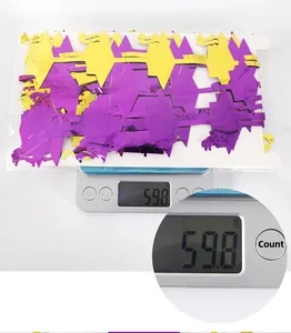 Detailed close-up of 59.8g purple and gold graduation foil curtain in retail packaging