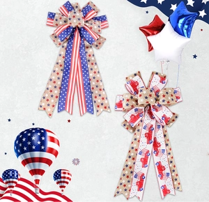 Detail of Independence Day burlap bows with stars, stripes and red truck prints