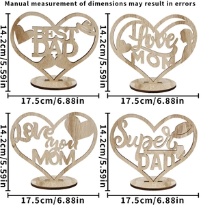 Detail view of laser-cut wooden heart ornament with Best Dad and Love Mom text