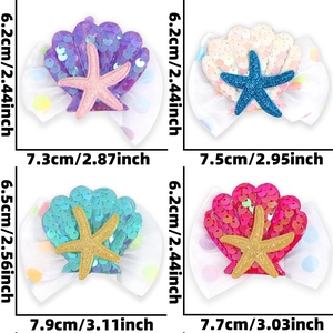Detail view of four shell-shaped sequin hair clips with star accents and size measurements