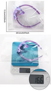 Detailed size and weight measurement of the purple sequin dolphin headband accessory