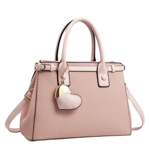 Pink woven texture handbag with heart pendant and detachable shoulder strap in white background