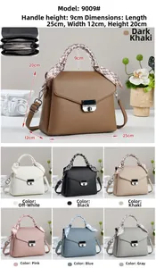 Détail du sac carré en cuir grainé avec poignée en foulard de soie et fermoir métallique