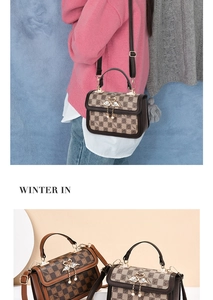 Detail of checkered crossbody bag featuring heart swan clasp and tassel charm