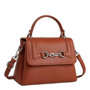 Caramel brown pebbled leather crossbody bag with silver horsebit buckle detail