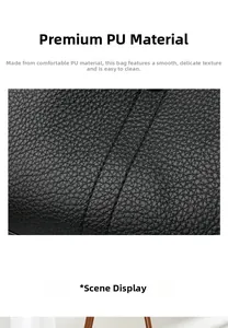 Detail of black lychee grain PU leather texture and durable double stitching of the bag