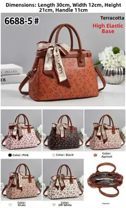 Detail of cherry print tote bag with lychee texture PU leather and dimensions 30x12x21cm