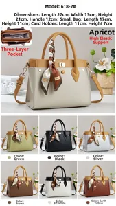 Detailed view of women's tote bag set with fabric texture, scarf, and three inner layers